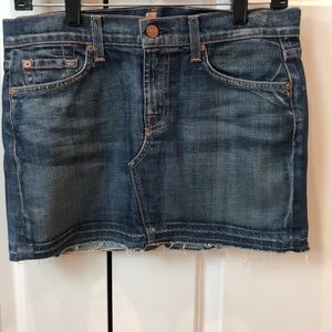 Perfectly distressed denim mini skirt